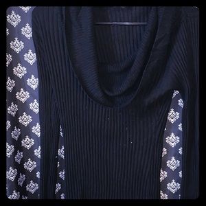 Black cowl neck sweater.